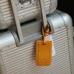 ISSIMO X Pineider Mustard Logo Luggage Tag