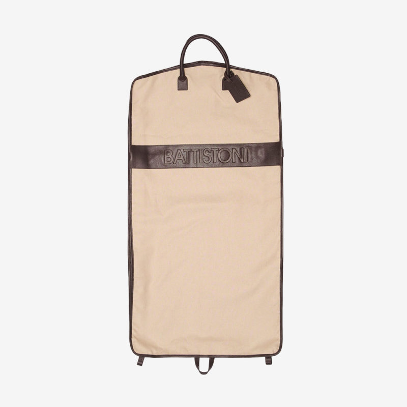 ISSIMO Friends Battistoni Canvas and Leather Garment Bag CANVAS GARMENT BAG WITH BROWN EMBOSSED LEATHER INSERTS Perfect to accomodate everything you need for a business trip or a week-end gateway 100% genuine leather inserts and pure canvas. 925 euros Accessories the chicissimo