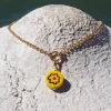Amourrina lido necklace yellow anemone black, detail lifestyle jewelry ISSIMO